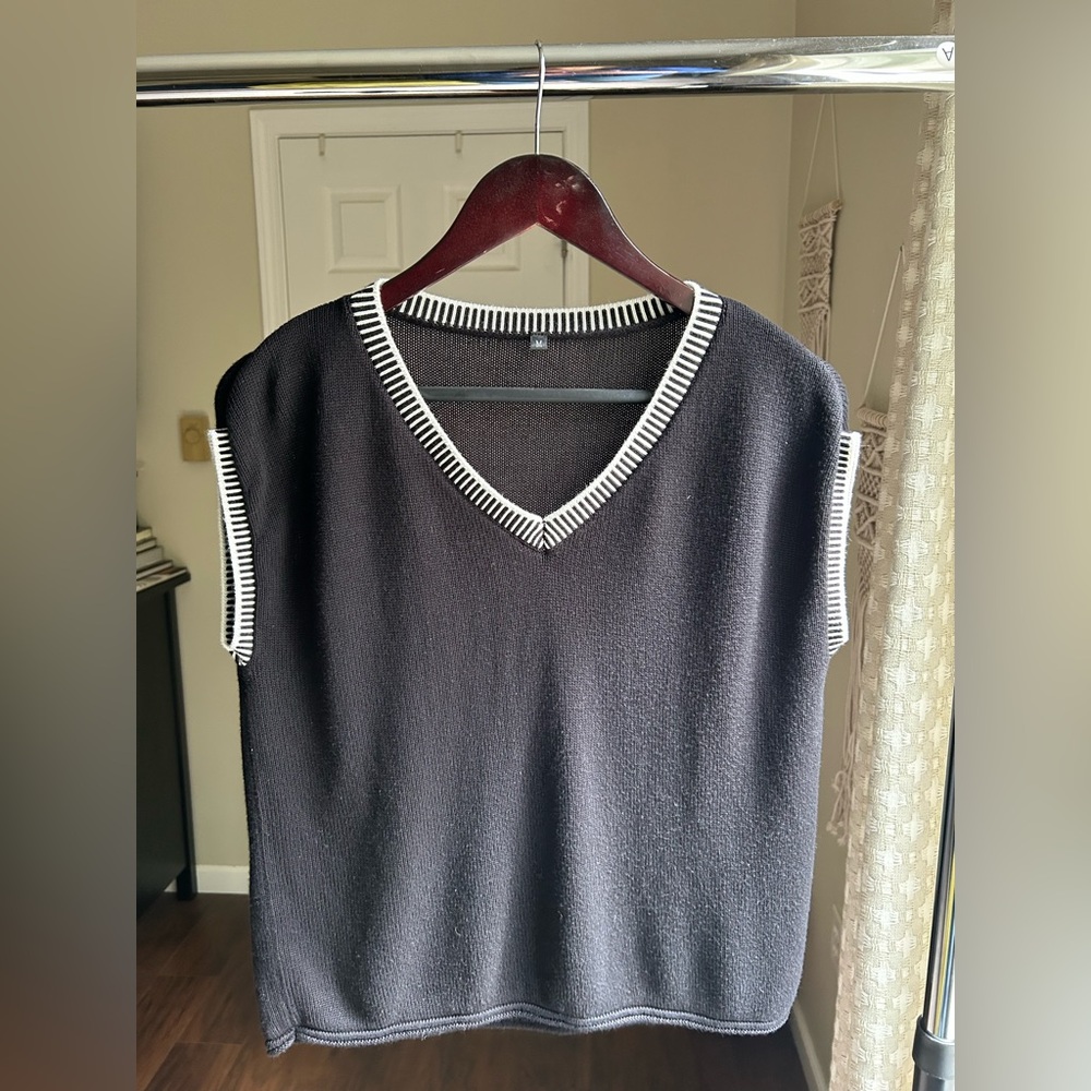 Black Sleeveless V-Neck Sweater with Striped Trim